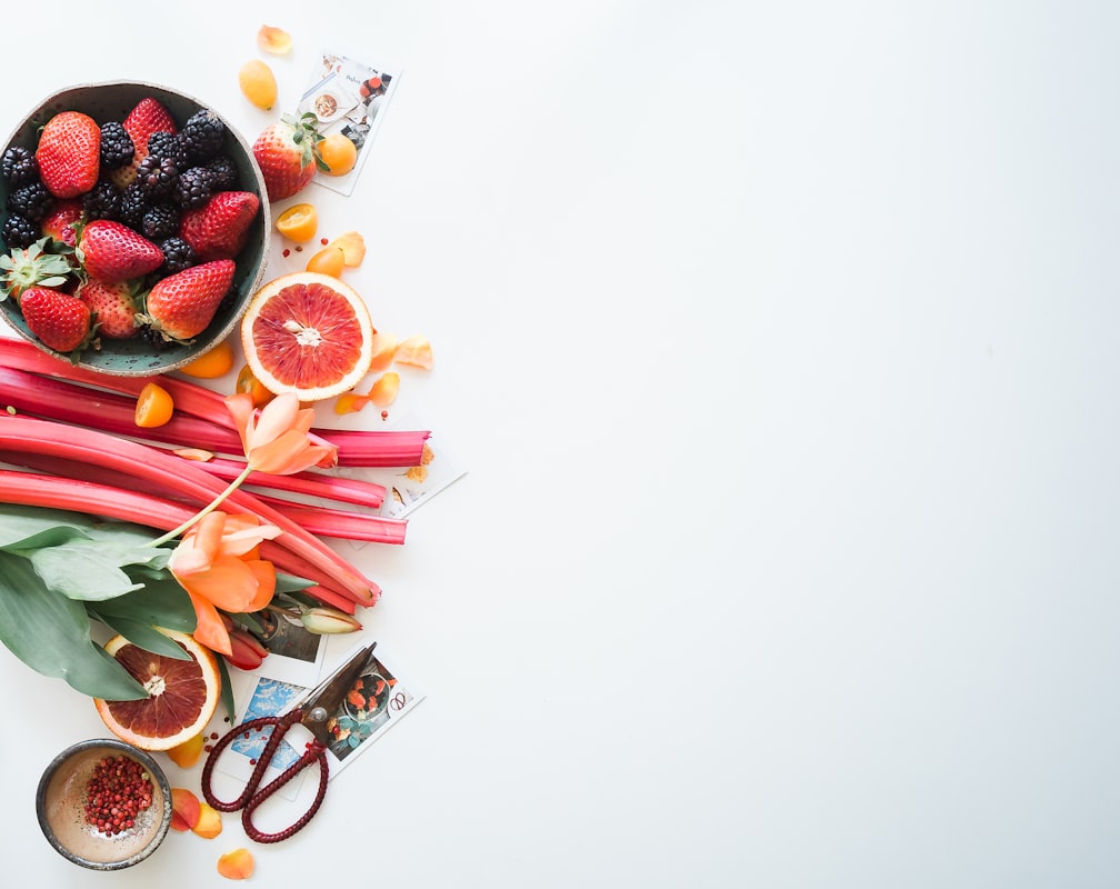 Fresh seasonal produce including berries and root vegetables